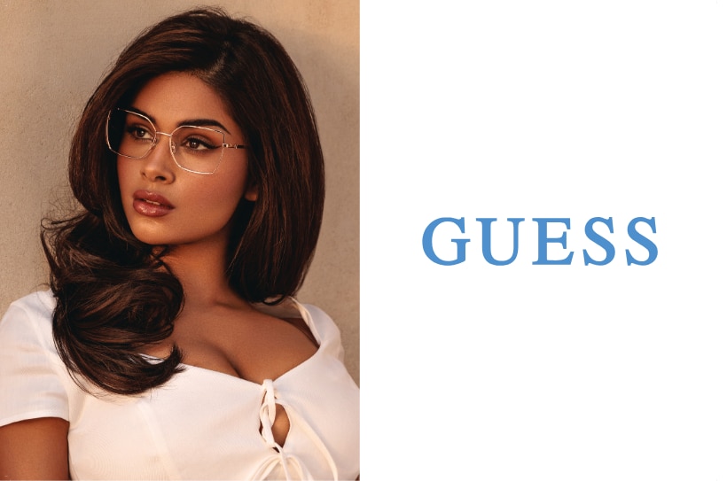 Vrouw met elegante Guess bril en wit topje, lang golvend haar