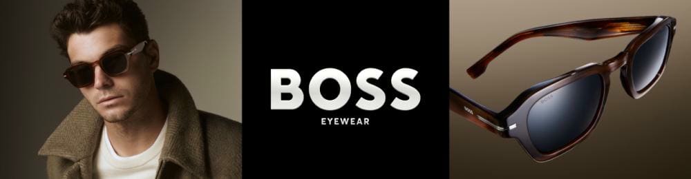 Homme aux cheveux courts portant des lunettes de soleil rectangulaires BOSS Eyewear et un manteau.